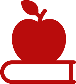 A red apple on top of a red book.